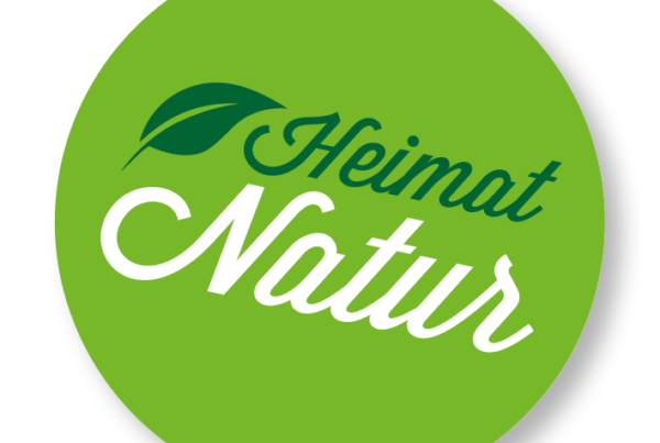 Grünes rundes Logo mit Schriftzug Heimat Natur