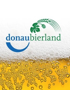 Logo mit Abbildung sprudelndem Bier und Schriftzug donaubierland