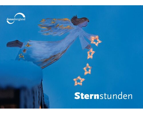 Donaubergland Postkartenmotiv mit Engel auf blauem Hintergrund mit vier beleuchteten Sternen, die aus dem Arm fallen.